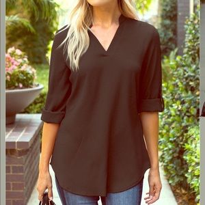Black roll tab sleeve, notch neck top.